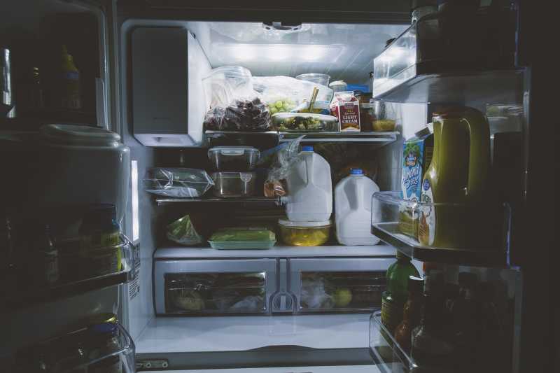 Inside view of a refrigerator full of food
