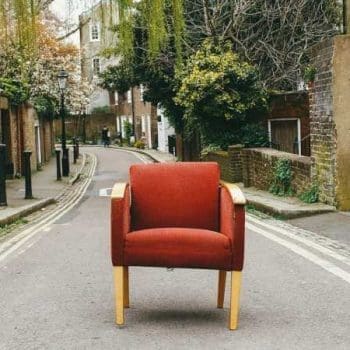 Orange chair standing in street