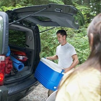 Couple packing a car before a move