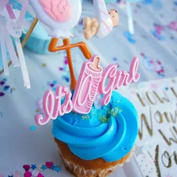 Cupcake at a gender reveal party for a new baby