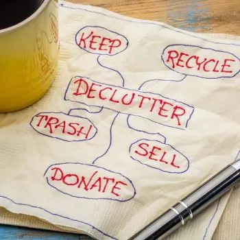 Napkin with the words "declutter, keep, recycle, trash, sell, donate" Relocation to Dallas, Tx